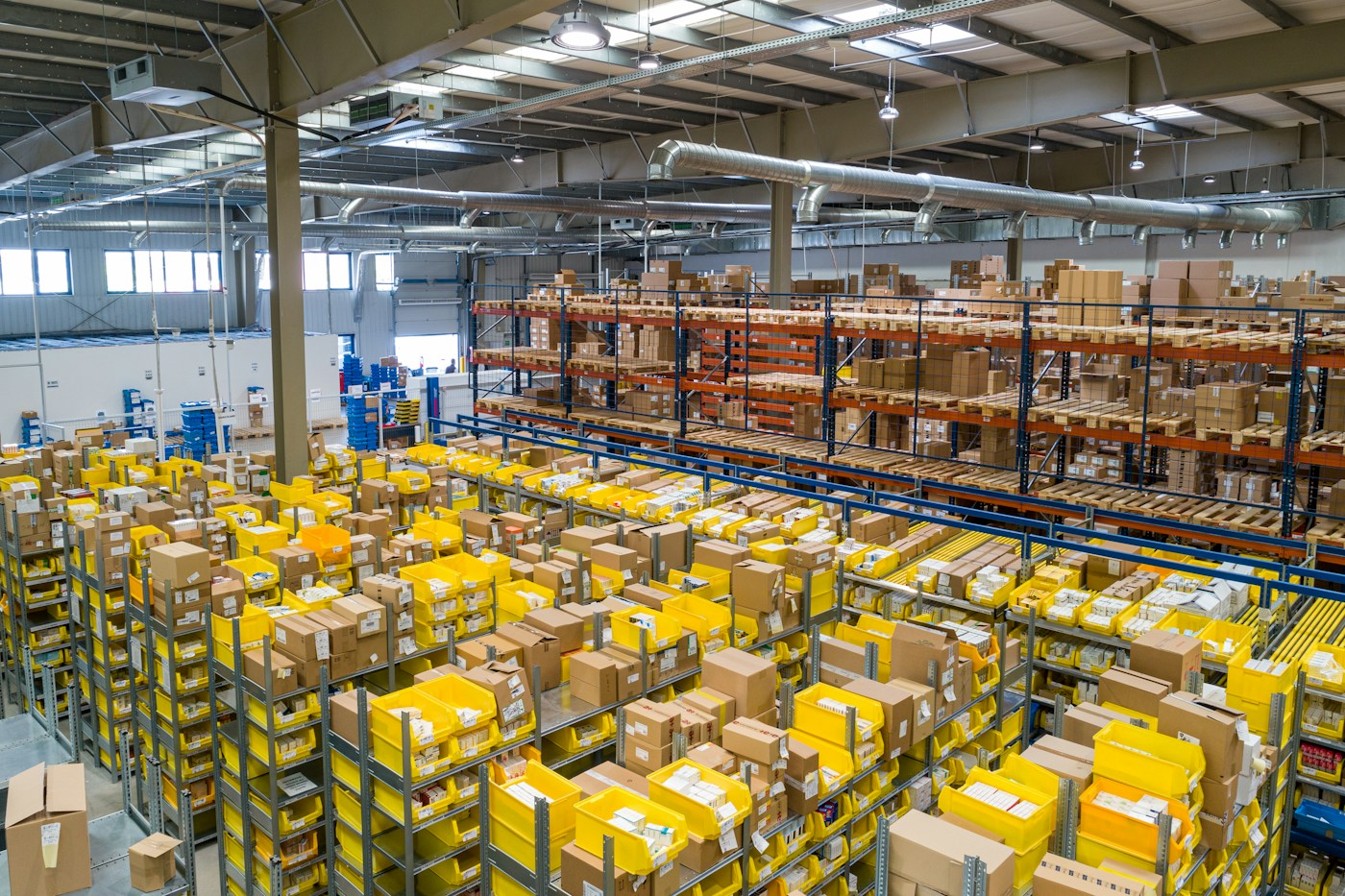 Illustrative warehouse interior with organised cargo and storage racks
